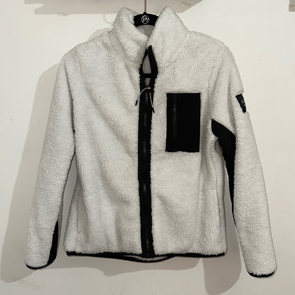 Women Calvin Klein puffy zip up sweater. White and black. Medium size.